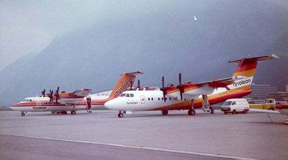 Dash 7s in old and new Tyrolean livery at Innsbruck airport