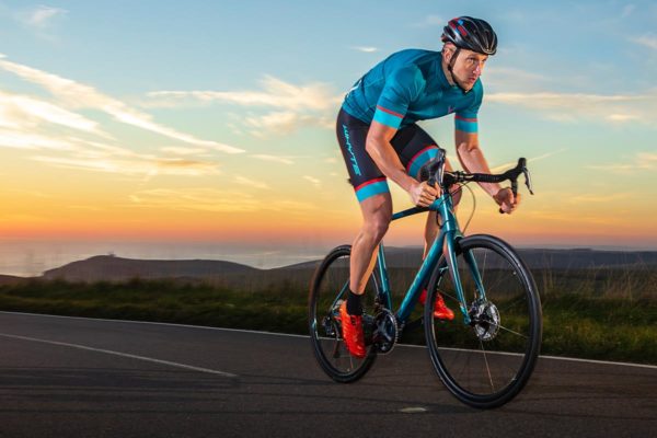 Man cycling on Road Bike - Home Mechanic PLUS Road Bike Course - Activate Cycle Academy