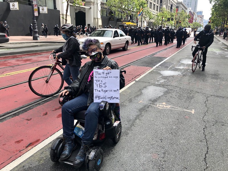 liz with protest sign
