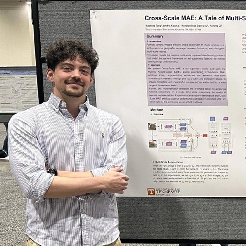 Kostas with a research poster