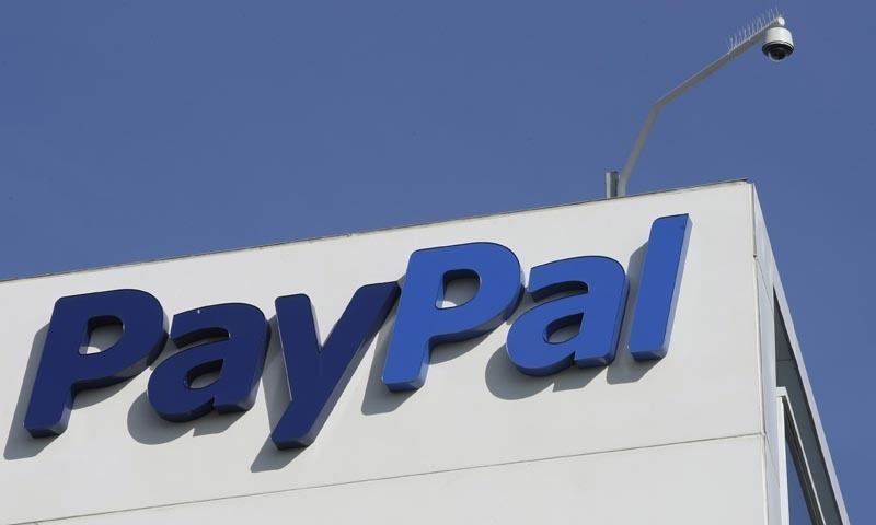 This file photo shows the logo for PayPal which owns the Xoom money transfer service. This file photo shows the logo for PayPal which owns the Xoom money transfer service.
