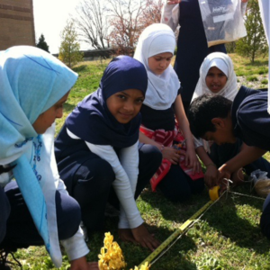 ABOUT-US-building-community-(circle-photo)