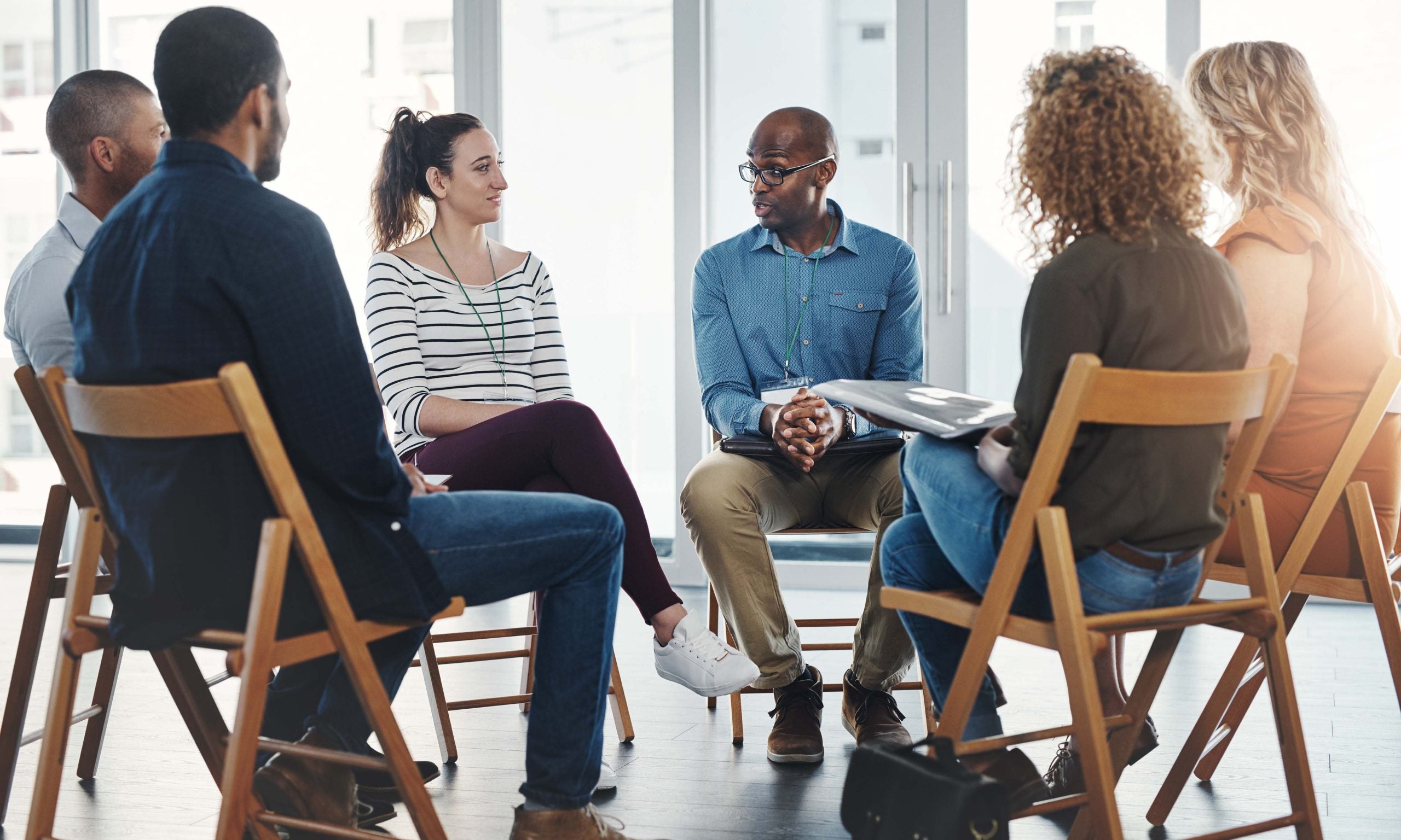 Counselor talking to a group of people