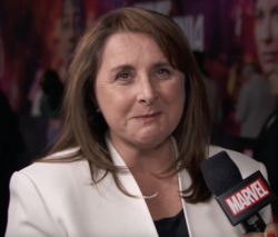 Victoria Alonso being interviewed at the premiere of Ant-Man and the Wasp: Quantumania in 2023