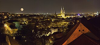 Zagreb at night, with a wide street and several tall buildings