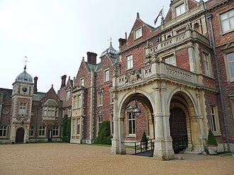 entrance front of house with porte-cochère