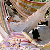 Jos� Gonzalez reclining in one of his hammocks