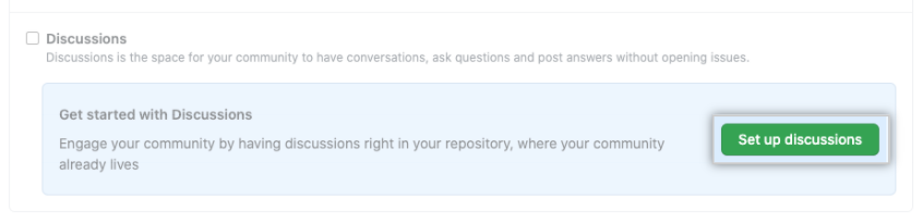 Set up a discussion button under "Features" for enabling or disabling GitHub Discussions for a repository