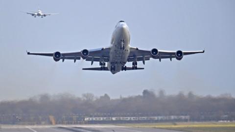 An aeroplane taking off at Gatwick Airport