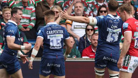 Sale Sharks Tom Roebuck celebrates his try against Leicester Tigers