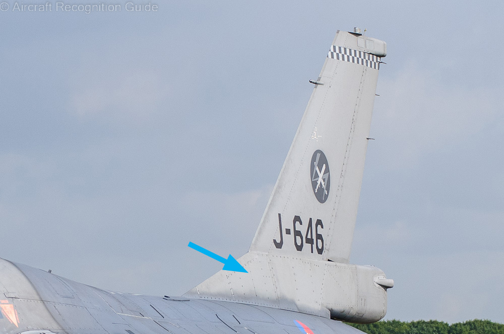 Common to all F-16A and -B versions is the gradually widening base of the vertical stabiliser, from the dorsal fin to the back. Note the extension beyond the rudder, which houses the optional drag chute. Image