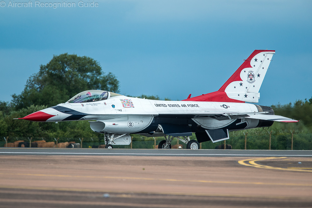 This Thunderbird F-16C Block 42 has no chin mounted sensors, but the straight petal plates of the nozzle, curved main landing gear door are landing lights attached to the nose gear door are obvious. Image