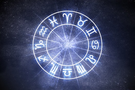 Astrology and horoscopes concept. Astrological zodiac signs in c Astrology and horoscopes concept. Astrological zodiac signs in circle on starry background.