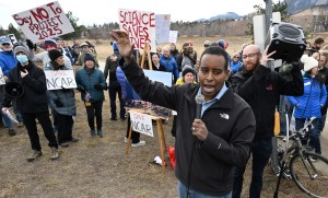 DCC-L-NCARpro675 Congressman Joe Neguse addresses a crowd of people during a rally in support of NCAR in Boulder on Dec. 20, 2025. (Cliff Grassmick/Daily Camera)