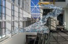 TDP-Z-Mountains-and-Rivers-Public-Art-Convention-Center-01 California artist Cliff Garten's "Mountains and Rivers Without End" hangs over escalators inside the new wing of Colorado Convention Center. (Photo by Jeremy Green, provided by Denver Arts & Venues)
