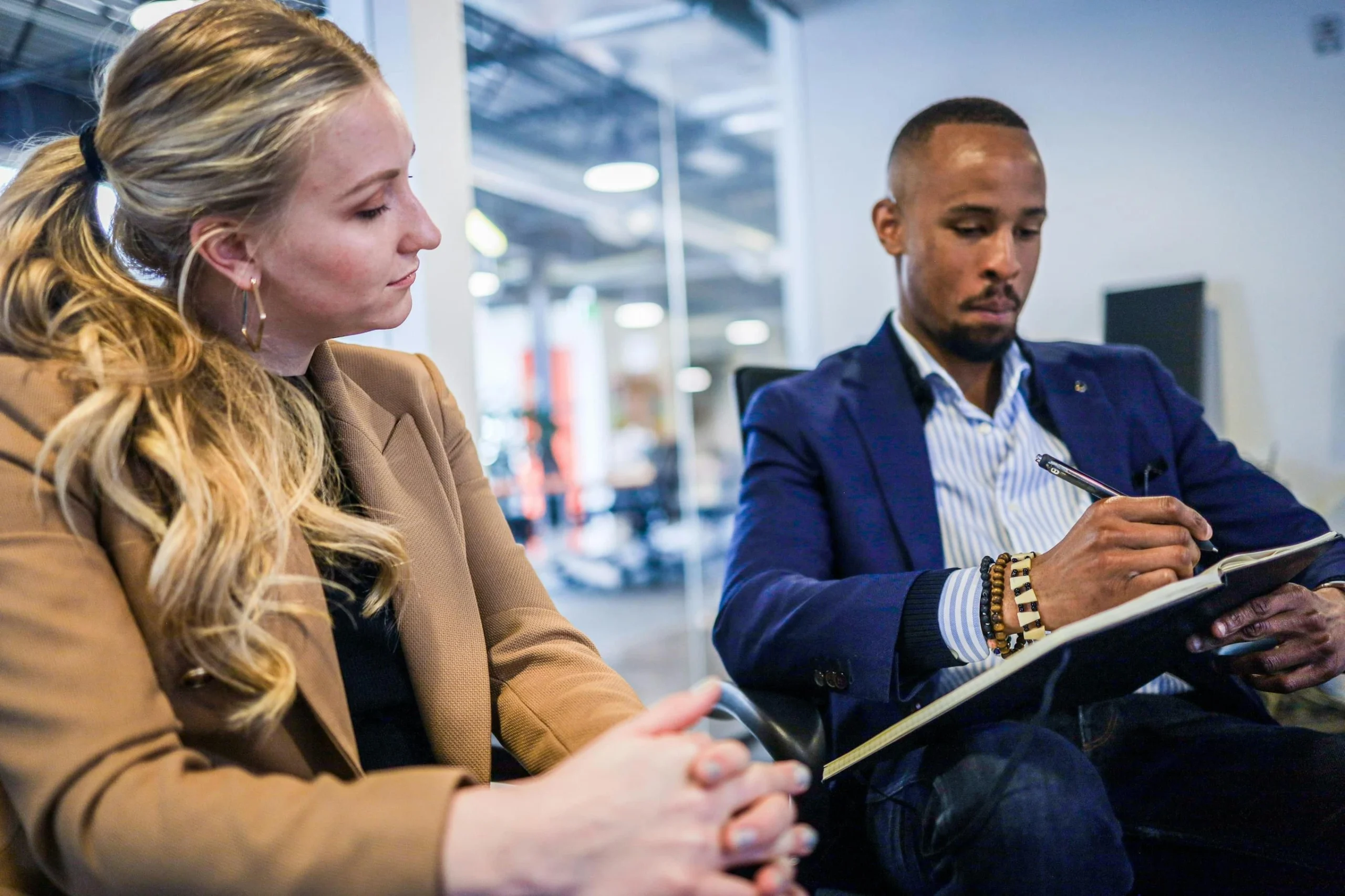 2 co-workers in a meeting