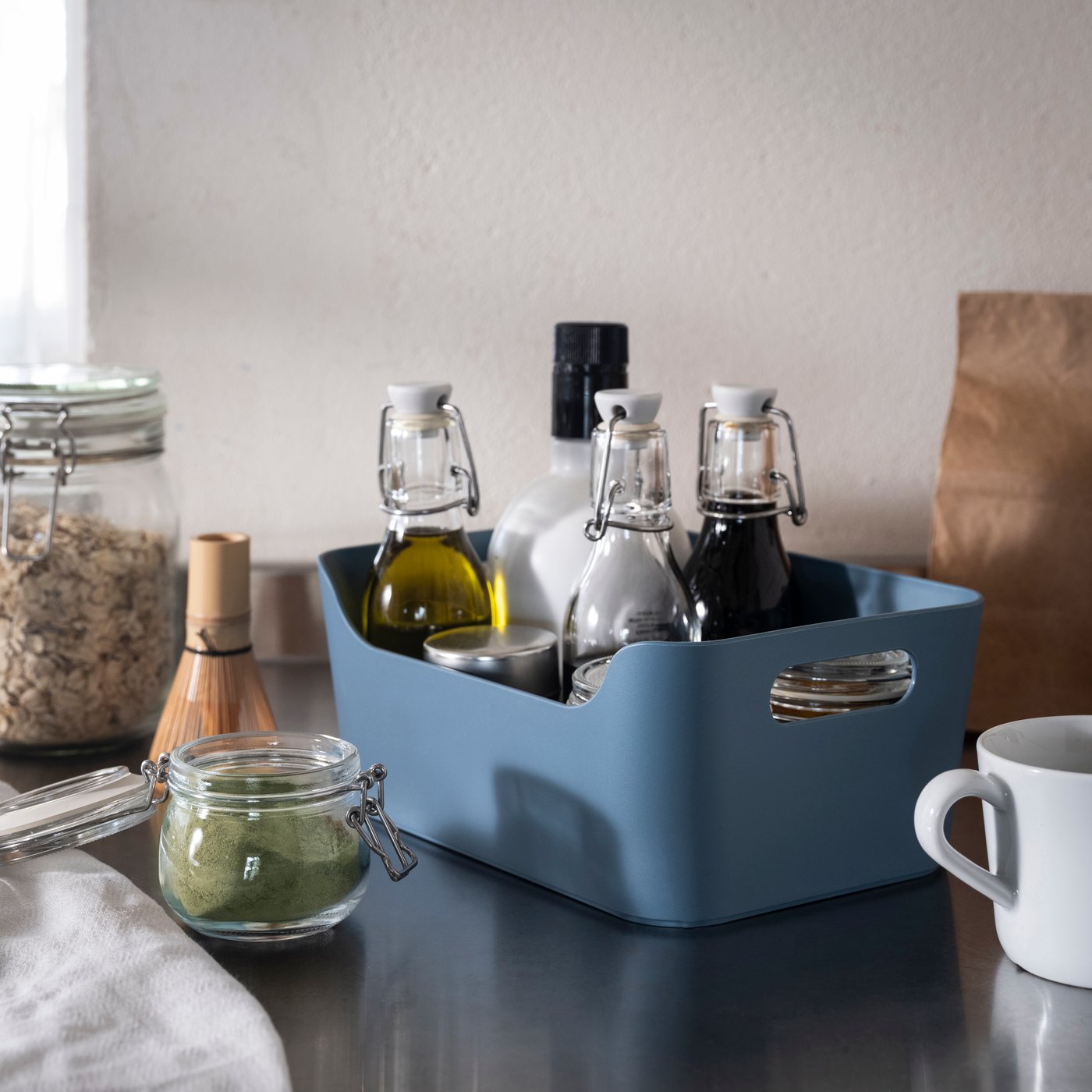 A grey-blue UPPDATERA box in the kitchen