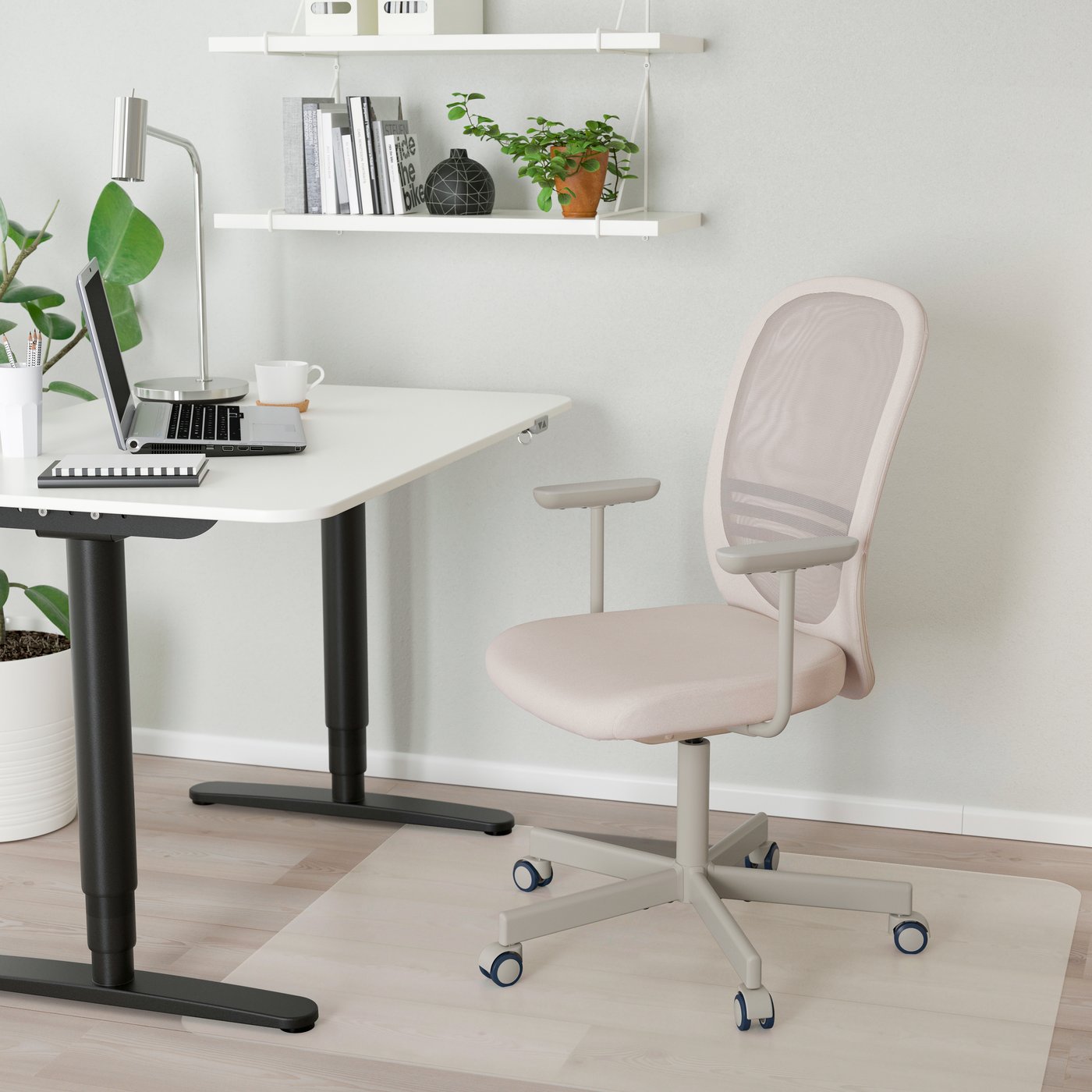 A beige FLINTAN office chair with armrests