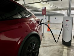 SUT-L-TESLA-CHARGING-0625-01 A Tesla fast-charging station at an indoor parking lot on the corner of Sixth Avenue and A Street in downtown San Diego. (Rob Nikolewski/The San Diego Union-Tribune)