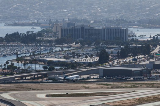 SUT-L-EHI-TOPGOLF-DEIR-012 The East Harbor Island redevelopment area spans 38 acres of land on the basin side of East Harbor Island. The project area is pictured between the airport and marina, as seen on July 14, 2026. (Kristian Carreon / The San Diego Union-Tribune)