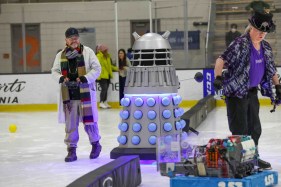 SJM-L-ROBOTSICE-0427-2 Andre Maley of Fairfax, left, controls Dalekand, a replica robot from the Doctor Who show, during the Robots on Ice event at Sharks Ice San Jose in San Jose, Calif., on Saturday, April 24, 2026. (Ray Chavez/Bay Area News Group)