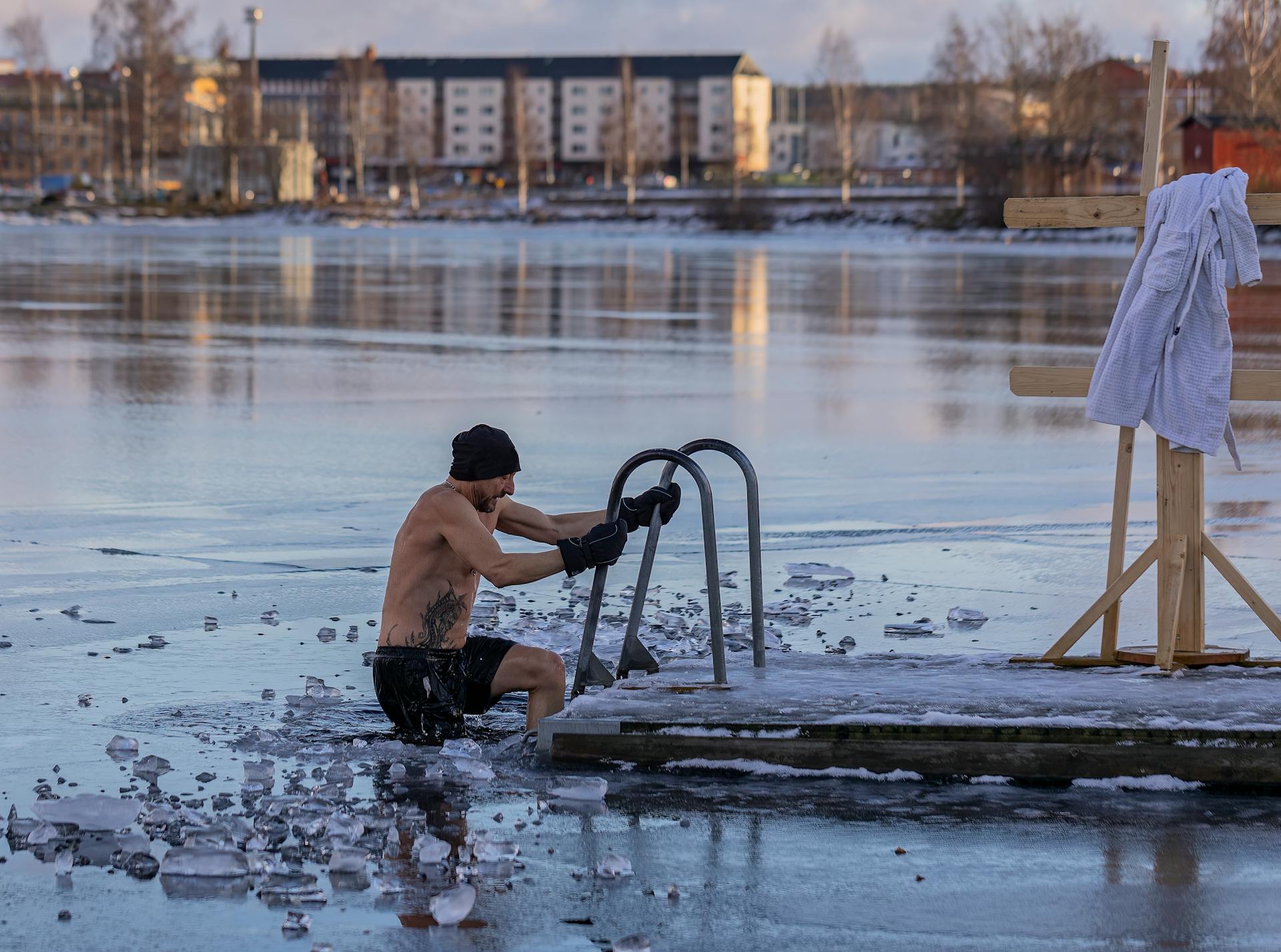 Person Taking A Dip In Icy Cold Lake